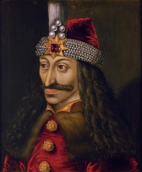 Vlad l'Impalatore ritratto mentre pranza osservando le sue vittime impalate.