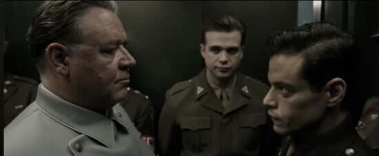Russell Crowe e Rami Malek in una scena del film Norimberga